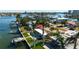 This waterfront property features a private pool, boat dock and stunning views at 10 Island Dr, Treasure Island, FL 33706