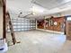 Spacious garage with ample storage; workbench and overhead storage at 10 Island Dr, Treasure Island, FL 33706