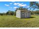 Charming shed in backyard, offering ample storage and potential for various uses at 13213 106Th Ave, Largo, FL 33774