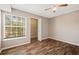 Spacious bedroom with large window and walk-in closet at 18106 Peregrines Perch Pl # 5204, Lutz, FL 33558