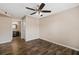 Spacious bedroom with ceiling fan and hardwood floors at 18106 Peregrines Perch Pl # 5204, Lutz, FL 33558