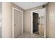 Inviting entryway with an open door revealing the interior at 18106 Peregrines Perch Pl # 5204, Lutz, FL 33558