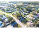 Aerial view of residential neighborhood showcasing numerous houses and surrounding landscape at 212 Francis Dr, Apollo Beach, FL 33572