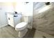 Updated bathroom with white vanity, marble shower, and modern fixtures at 212 Francis Dr, Apollo Beach, FL 33572