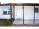 Front entrance with covered porch and screened enclosure at 212 Francis Dr, Apollo Beach, FL 33572