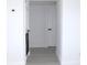 Clean hallway with light grey flooring at 212 Francis Dr, Apollo Beach, FL 33572