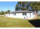 Rear view of house, showing the backyard at 212 Francis Dr, Apollo Beach, FL 33572