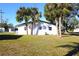 Rear view of house with a large backyard at 212 Francis Dr, Apollo Beach, FL 33572