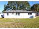 Rear view of house, showing the backyard at 212 Francis Dr, Apollo Beach, FL 33572