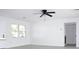 Spacious living area with large window and neutral decor at 212 Francis Dr, Apollo Beach, FL 33572