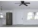 Bright living room with ceiling fan and modern flooring at 212 Francis Dr, Apollo Beach, FL 33572
