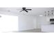 Open concept living space with kitchen and access to patio at 212 Francis Dr, Apollo Beach, FL 33572