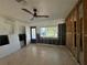 A living room undergoing renovation, new flooring installed at 2463 Baywood E Dr, Dunedin, FL 34698