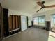 Sunroom under renovation, featuring a ceiling fan at 2463 Baywood E Dr, Dunedin, FL 34698