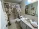 Clean bathroom with tub, shower, and vanity at 2960 59Th S St # 411, Gulfport, FL 33707