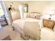 Comfortable bedroom with ensuite access, neutral decor, and an inviting comfortable atmosphere at 2960 59Th S St # 411, Gulfport, FL 33707