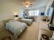 Guest bedroom with twin beds and window at 2960 59Th S St # 411, Gulfport, FL 33707
