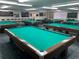 A classic billiard room equipped with multiple pool tables, providing a recreational space for residents to enjoy at 2960 59Th S St # 411, Gulfport, FL 33707