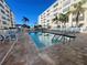 Inviting community pool with plenty of lounge chairs at 2960 59Th S St # 411, Gulfport, FL 33707