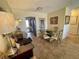 Dining area with a view into the kitchen and living room at 2960 59Th S St # 411, Gulfport, FL 33707