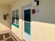 Private condo entrance with a numbered door at 2960 59Th S St # 411, Gulfport, FL 33707