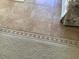 Beige tile floor with decorative border and carpet inset at 2960 59Th S St # 411, Gulfport, FL 33707