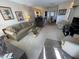 Spacious living room with comfortable seating and view of dining area at 2960 59Th S St # 411, Gulfport, FL 33707