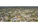 Aerial view showcasing the property's location in a residential neighborhood at 3044 Golden Rain Dr, Sarasota, FL 34232