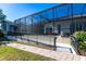 Accessible ramp leading to a screened-in patio at 3812 Carupano Ct, Punta Gorda, FL 33950