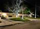 House exterior at night, well lit with landscaping and driveway at 4145 Harrisburg Ne St, St Petersburg, FL 33703