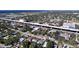 Aerial view of house and neighborhood near highway and waterfront at 4510 W Mcelroy Ave, Tampa, FL 33611