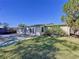 Spacious backyard with a patio and grassy area at 4510 W Mcelroy Ave, Tampa, FL 33611