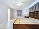 Bright bedroom with king-size bed and window coverings at 4510 W Mcelroy Ave, Tampa, FL 33611
