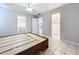 Bedroom with king-size bed and access to bathroom at 4510 W Mcelroy Ave, Tampa, FL 33611