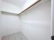 Large walk-in closet with a hanging rod and shelving at 4510 W Mcelroy Ave, Tampa, FL 33611