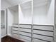 Spacious walk-in closet with built-in shelves and drawers at 4510 W Mcelroy Ave, Tampa, FL 33611