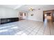 Bright and airy living room with tile floors and access to the outside at 4510 W Mcelroy Ave, Tampa, FL 33611