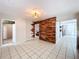 Open living area with a view of a hallway and other rooms at 4510 W Mcelroy Ave, Tampa, FL 33611
