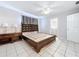 Main bedroom with a king-size bed and ample floor space at 4510 W Mcelroy Ave, Tampa, FL 33611