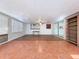 Sunroom with terracotta tile floor and lots of natural light at 4510 W Mcelroy Ave, Tampa, FL 33611