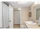 Shower/tub combo and white vanity with granite top at 4900 38Th S Way # 305, St Petersburg, FL 33711