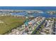 Aerial view showing home's location on the waterfront with access to canals at 514 77Th St, Holmes Beach, FL 34217