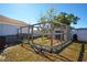 Well-maintained backyard with a chicken coop at 5224 Courtland Rd, Spring Hill, FL 34608