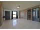 Living room with tiled floors and neutral-toned walls at 5224 Courtland Rd, Spring Hill, FL 34608