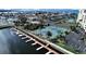 Aerial view of the community waterfront condos, tennis courts, and boat docks at 5915 Sea Ranch Dr # 408, Hudson, FL 34667