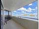 Enjoy the scenic water views from this condo's private balcony with black metal railing at 5915 Sea Ranch Dr # 408, Hudson, FL 34667