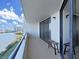 Relax on the balcony with expansive water views and refreshing coastal breezes at 5915 Sea Ranch Dr # 408, Hudson, FL 34667