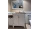 Bathroom with vanity, toilet, and mirror at 6020 Shore S Blvd # 301, Gulfport, FL 33707