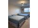 Guest bedroom with two twin beds at 6020 Shore S Blvd # 301, Gulfport, FL 33707