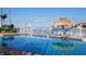 Relaxing waterfront pool with patio furniture at 6020 Shore S Blvd # 301, Gulfport, FL 33707